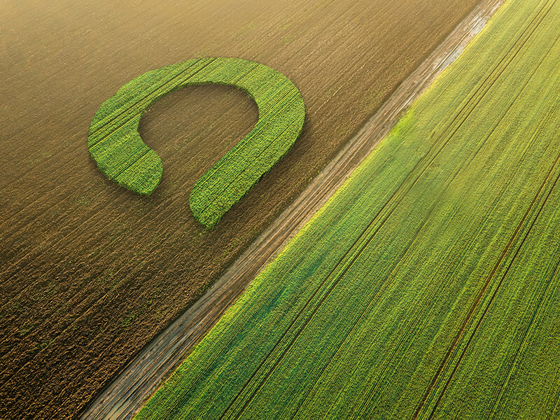 amiad logo on a plowed field